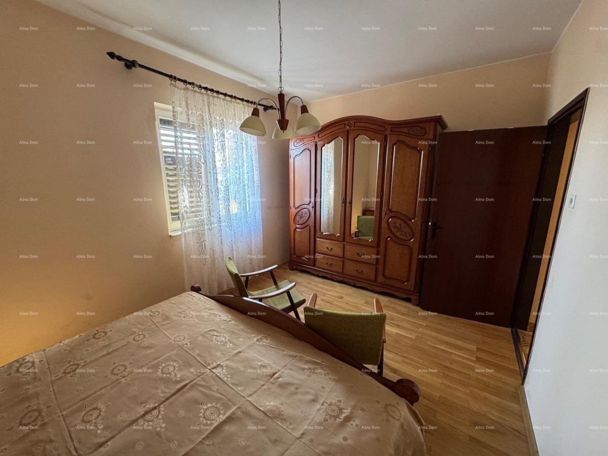 Kuća u centru Marčane s 2 stana, konobom i radionom 9