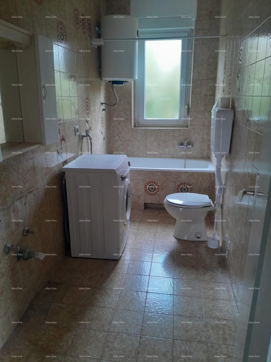 Vendita – Primo Piano di una Casa con Giardino e Parcheggio 14