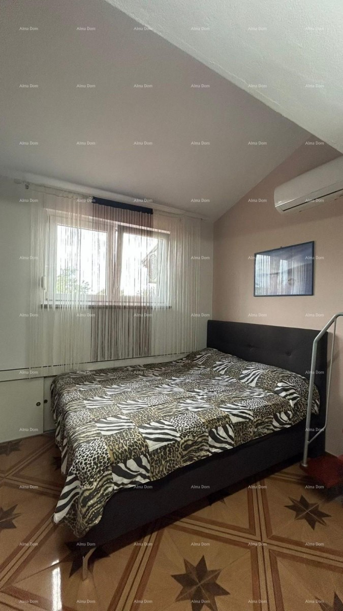 Pula Veli vrh. We are selling a house with multiple apartments and a swimming pool. 33