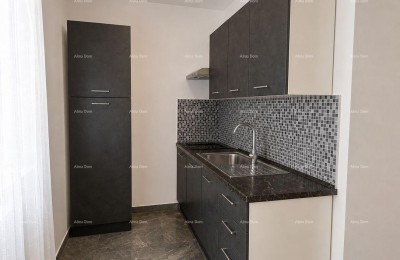 Renovated apartment in the center of Pula, 50 m² with underfloor heating and modern design