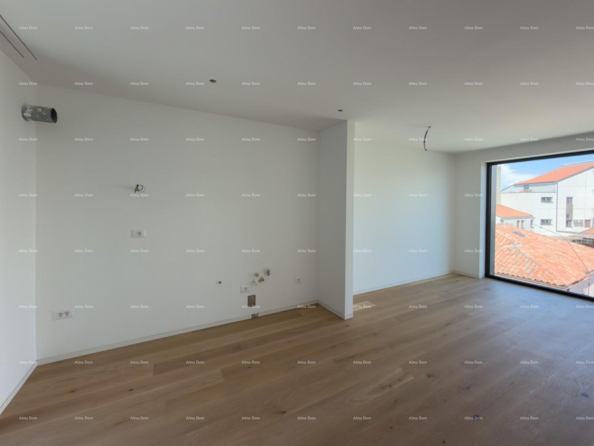 Sale of apartments in a residential-commercial building with a sea view, center of Umag! / S9a 20