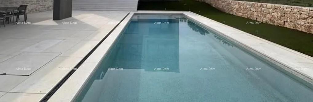 A modern house with a pool is for sale, located in an idyllic village near Rovinj. 2
