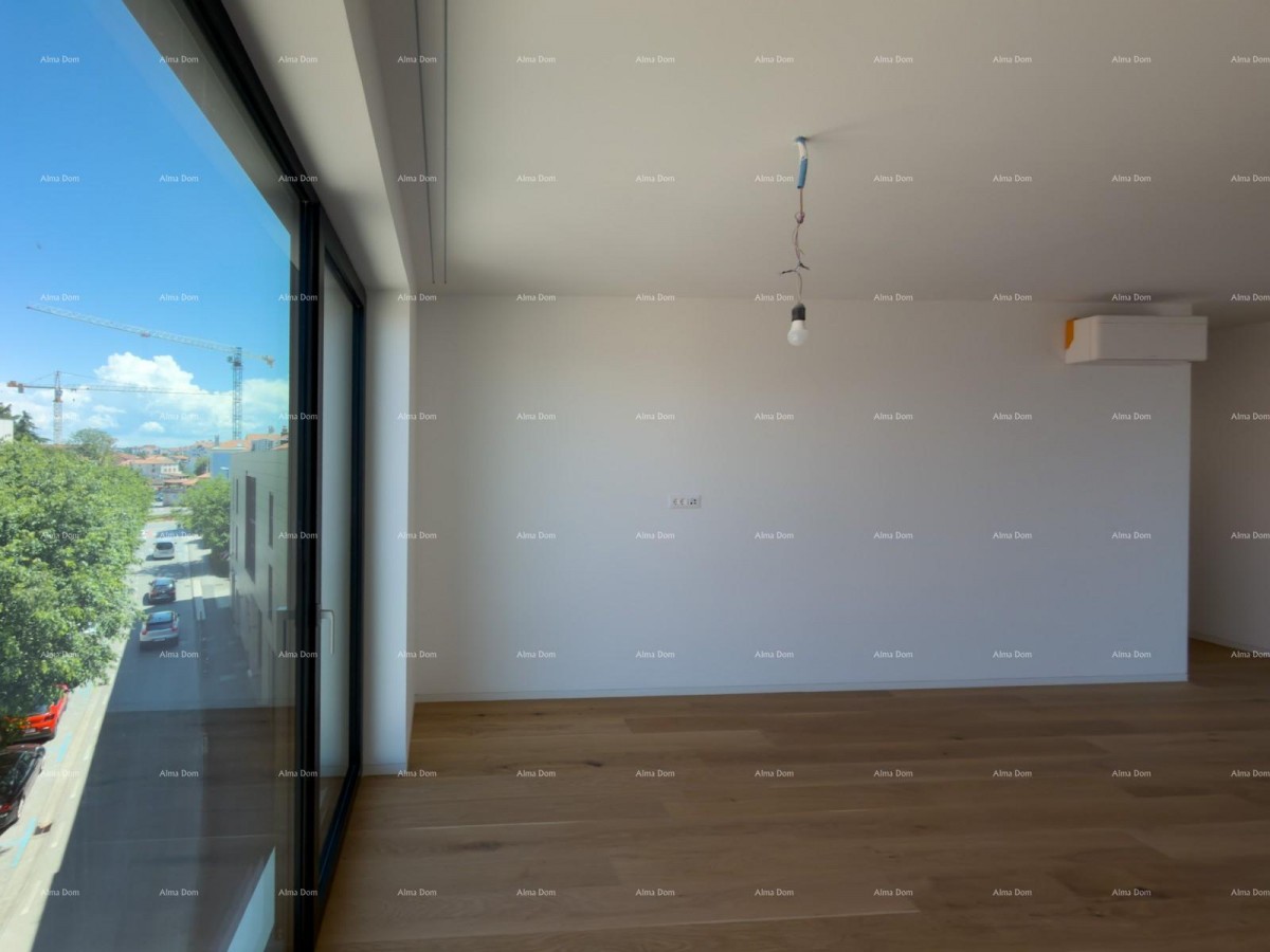 Sale of apartments in a residential-commercial building with a sea view, center of Umag! / S9a 19