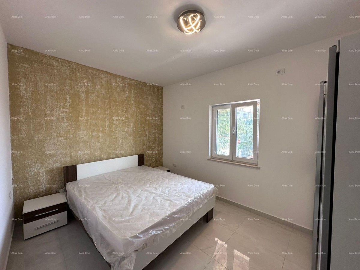 Prodaja fantastične hiše s tremi stanovi v Medulinu! 35