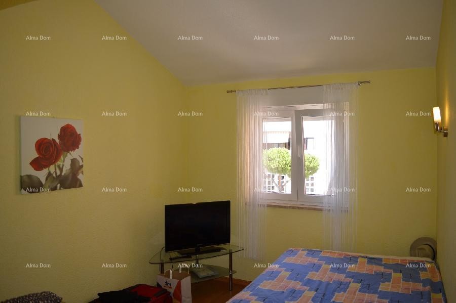 House with four separate apartments. 1 km to Verudela. 19