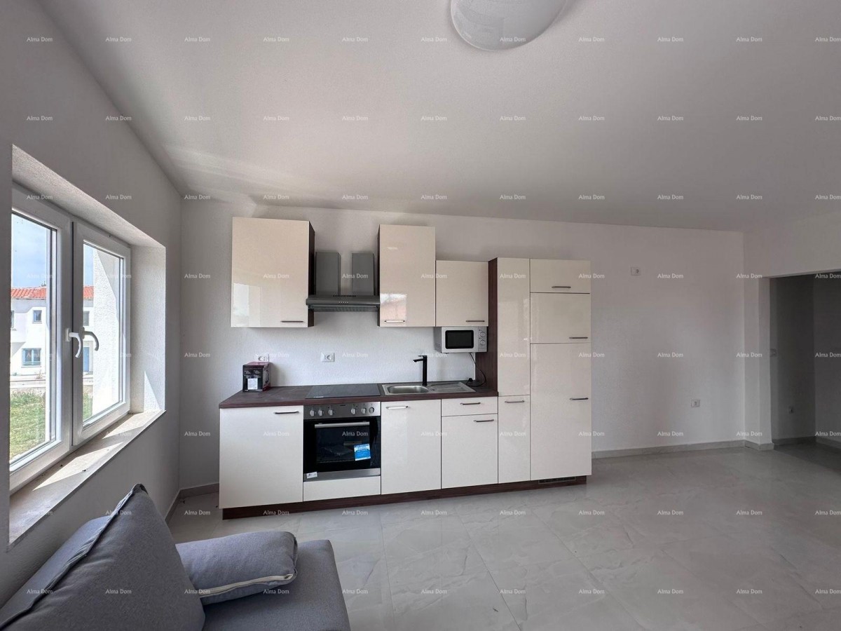 Prodaja fantastične hiše s tremi stanovi v Medulinu! 25