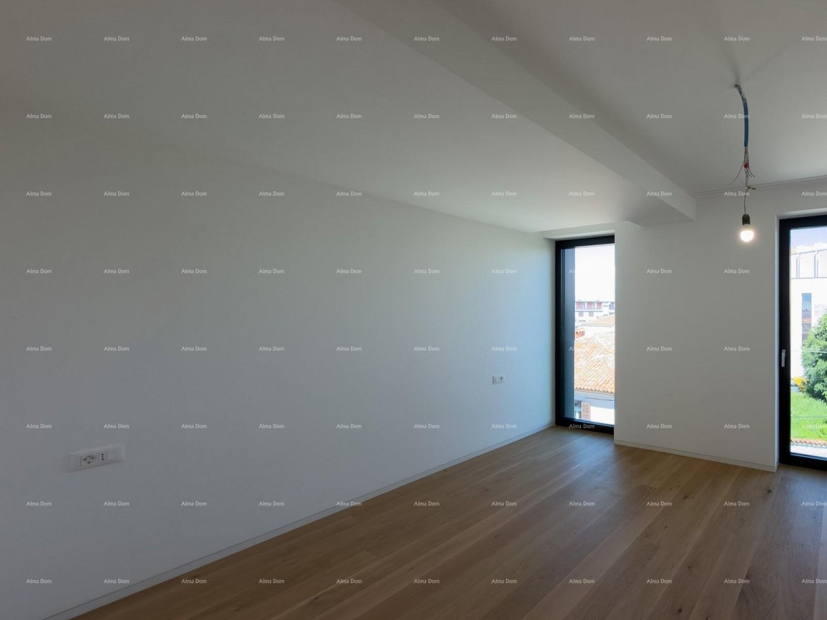 Sale of apartments in a residential-commercial building with a sea view, center of Umag! / S9a 13