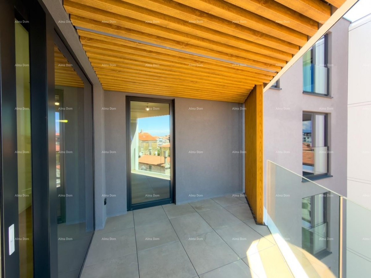 Sale of apartments in a residential-commercial building with a sea view, center of Umag! / S9a 24