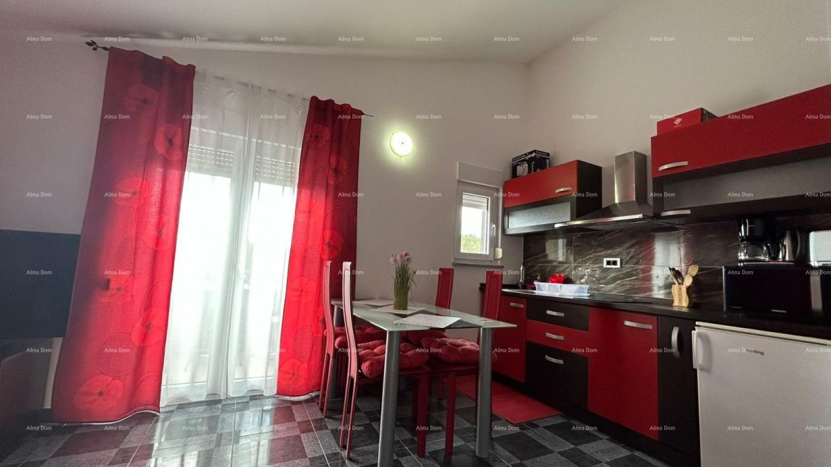 Pula Veli vrh. We are selling a house with multiple apartments and a swimming pool. 21