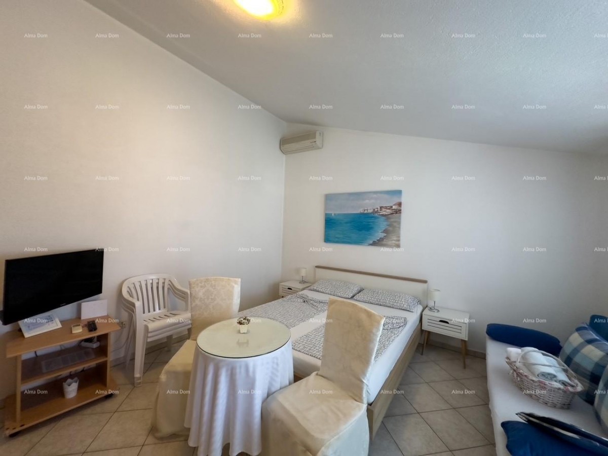 МЕДУЛИН! Студия-апартамент на втором этаже многоквартирного дома. 6